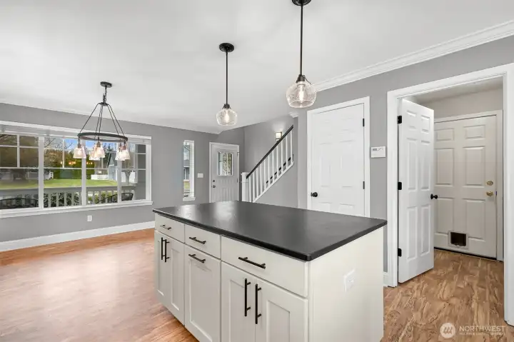 Laundry, garage, and walk-in pantry straight ahead