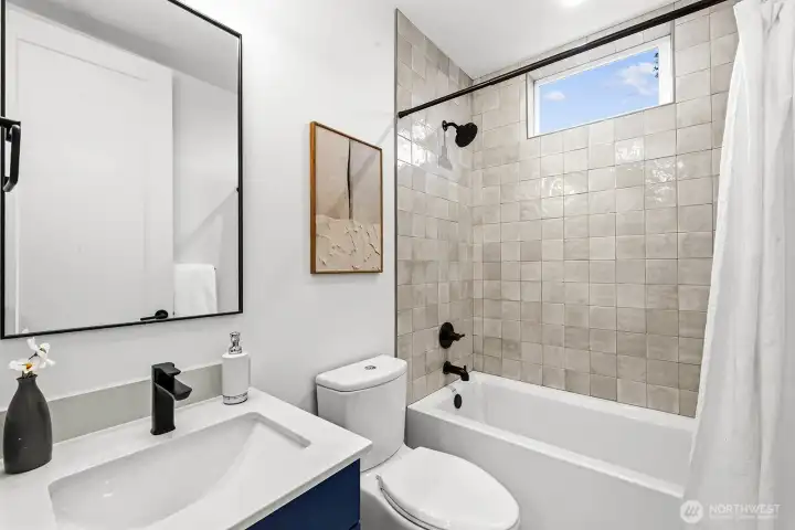 Full shared bathroom on the main floor.