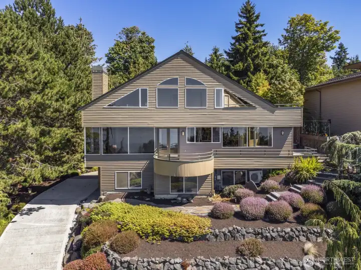 Professionally landscaped for easy care. The home was just completly pinted inside and out.