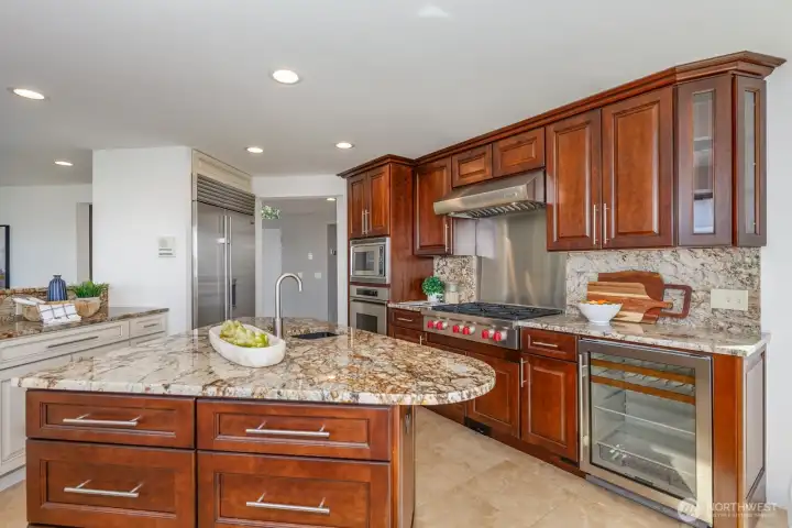 All SS appliances. Dacor, Sub Zero, Wolf, GE Profile. Note the wine fridge.