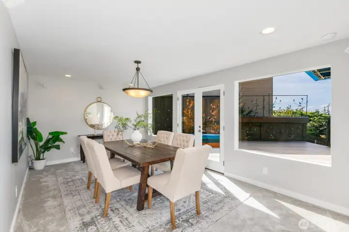 This room can be a formal dining room or a family room.