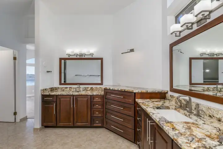 And a third vanity sink! The walk in closet is to the left.