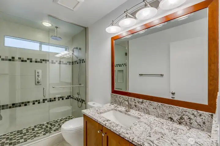 The lower level bath has been totally redone.