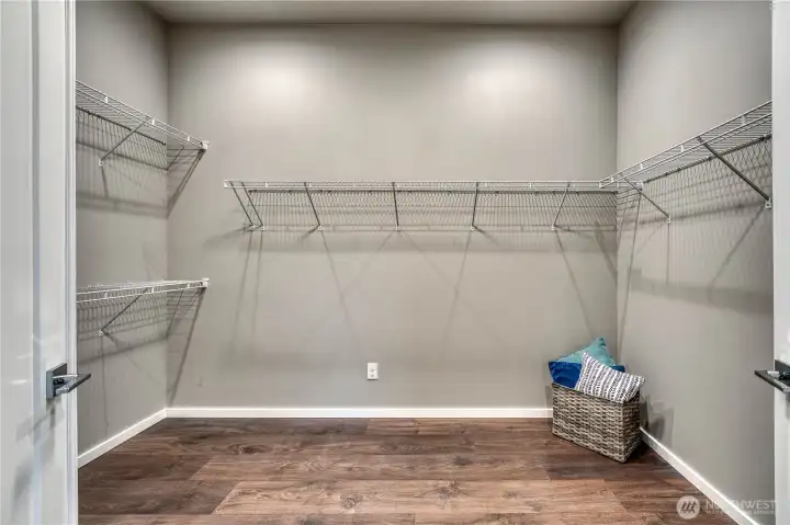 Spacious walk in closet awaits a new wardrobe.
