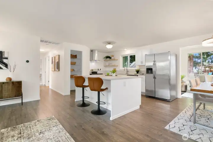 Kitchen has large island with room for food prep or dining
