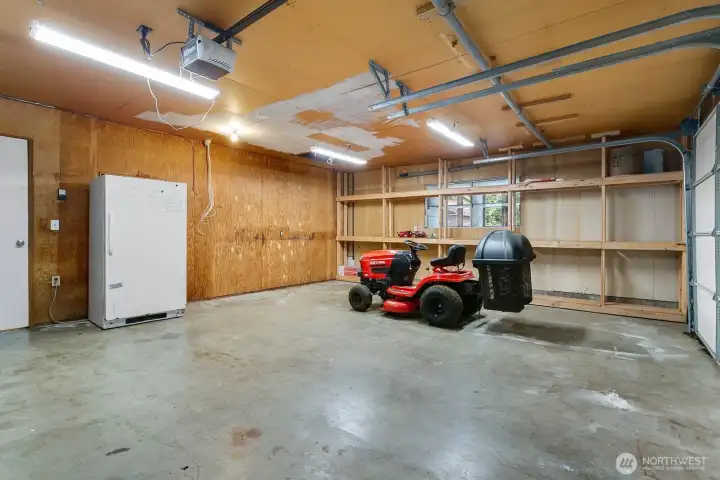 2 car garage with storage and freezer