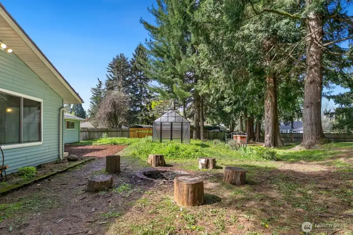 Greenhouse and firepit