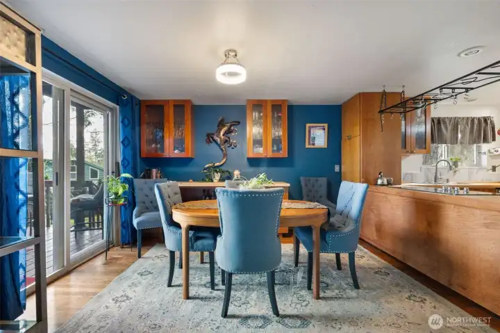 Dining area with built in cabinets & buffet for entertaining and storing your special serving ware.