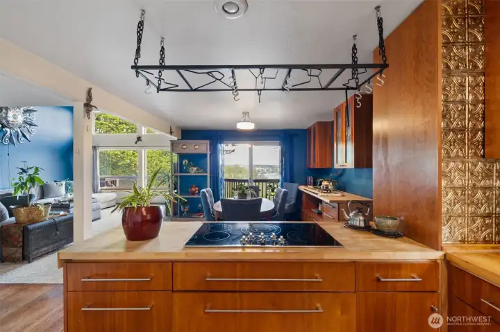 Stay connected with everyone in the open concept kitchen.