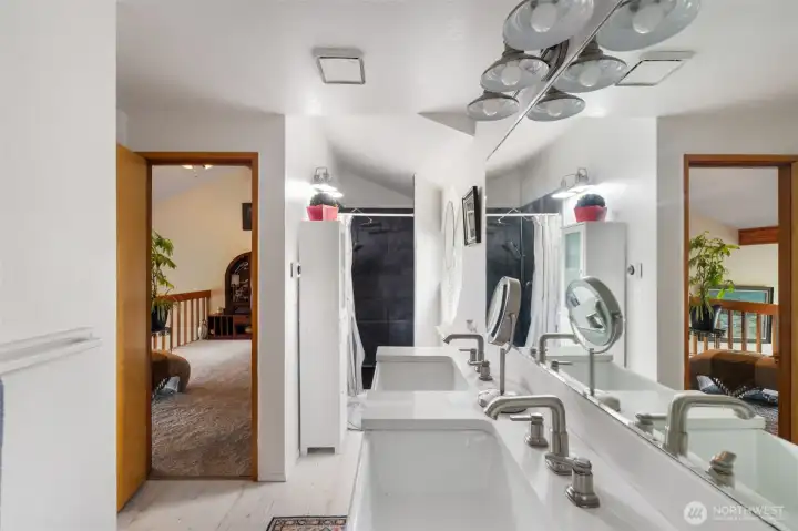 Upper bathroom has separate bath tub and shower.
