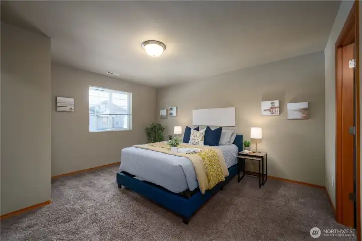 generous primary bedroom