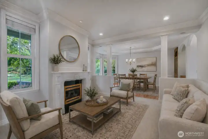 Separate living room w/fireplace great for entertaining or a piano!  Virtually staged.