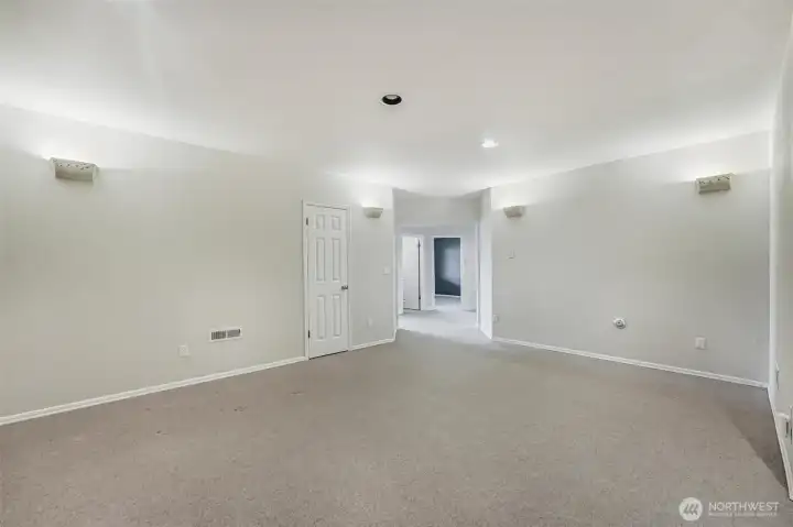 This theater room or guest family room has plenty of room for large furniture and many guests!