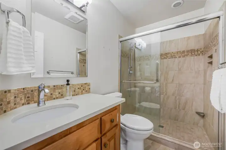 2nd Guest bath downstairs offers a walk in shower for convenience!