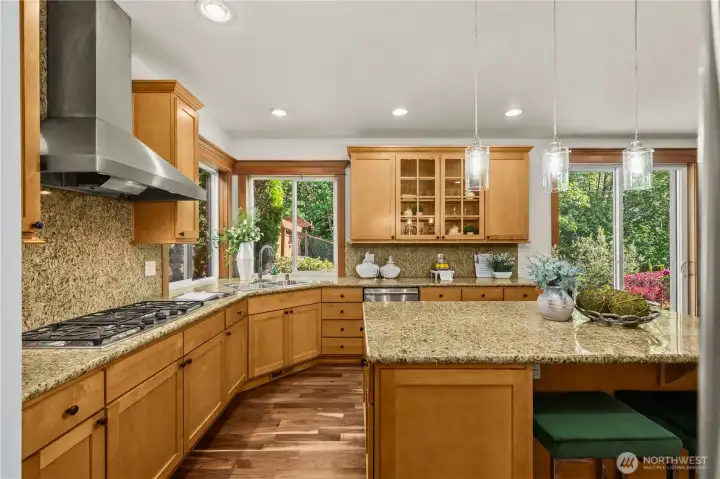 Expansive windows bring in abundant natural light and serene garden views,