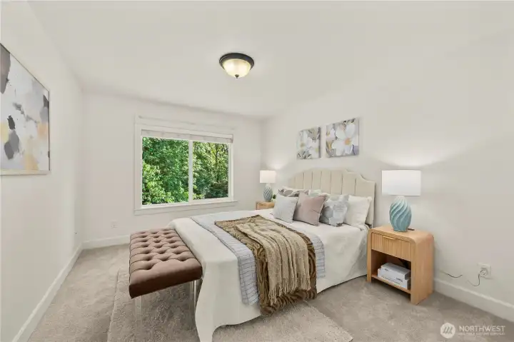 Bright and peaceful 2nd  bedroom overlooking the private backyard