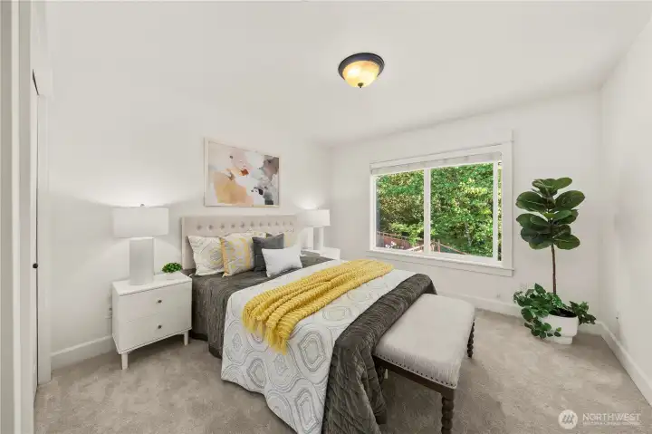 3rd bedroom upstairs offers serene greenery views and exceptional privacy