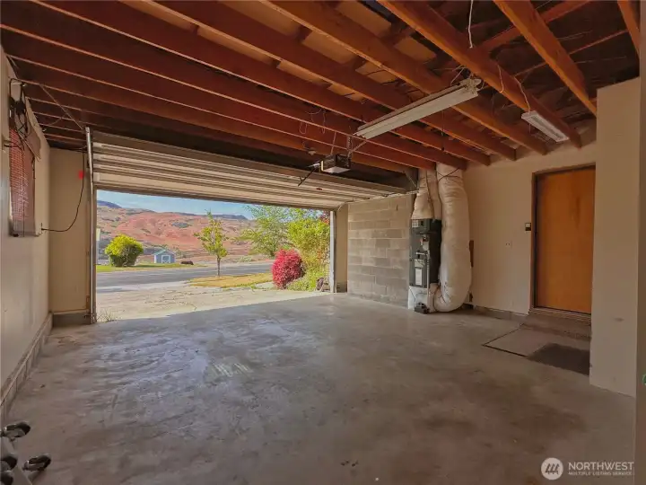 Attached 480sf double-car garage with direct access into the kitchen for added convenience.