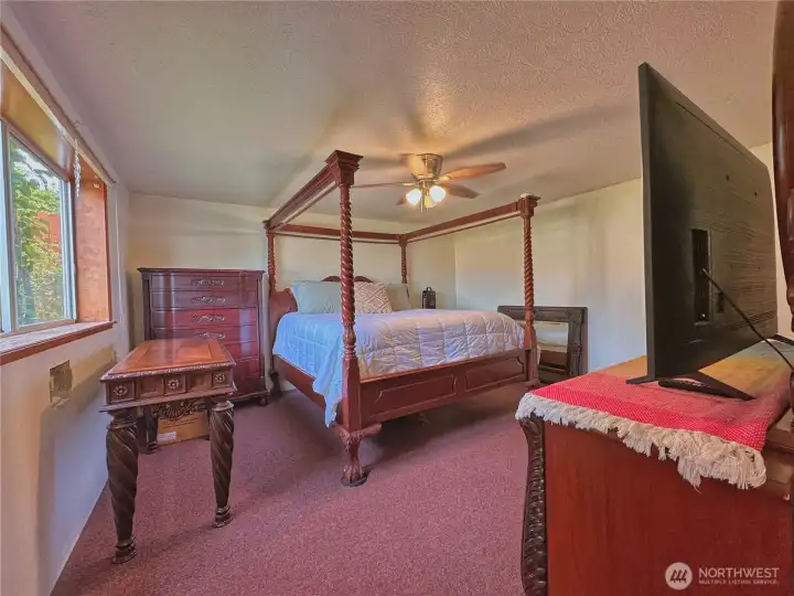Main floor bedroom in ADU (furniture not included).