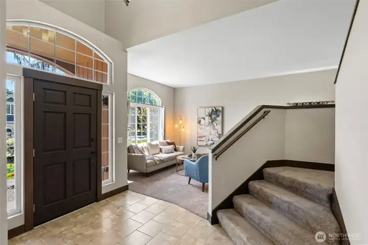 Step inside to refreshed surfaces, including carpet, paint, and ceramic tile flooring. Arched windows bring character and tons of natural light into this beauty.