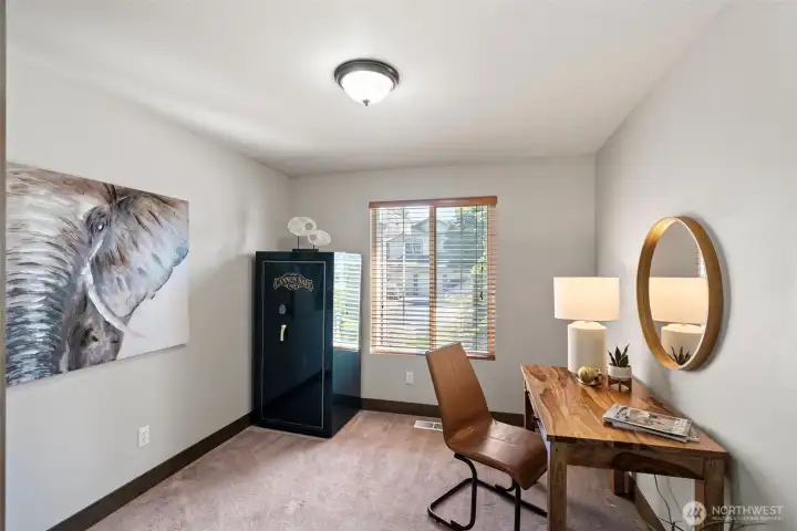 An office on the main level keeps a convenient work space handy. (The safe in this picture is negotiable.)