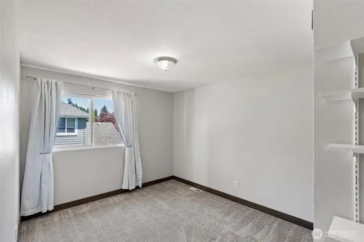 One of the three bedrooms this home enjoys.