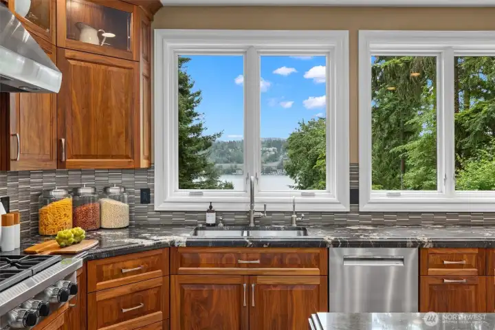 Enjoy lake views along with the upgraded appliances, walnut cabinets, and slab granite surfaces. Enjoy lake views along with the upgraded appliances, walnut cabinets, and slab granite surfaces.