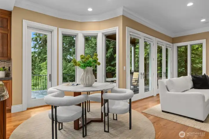 Even casual meals are a treat in the windowed breakfast nook spanned by picturesque scenery. Even casual meals are a treat in the windowed breakfast nook spanned by picturesque scenery.