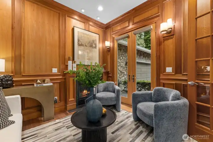 A second office/sitting room off the foyer mirrors the first with an additional fireplace & set of French doors to the driveway. A second office/sitting room off the foyer mirrors the first with an additional fireplace & set of French doors to the driveway.