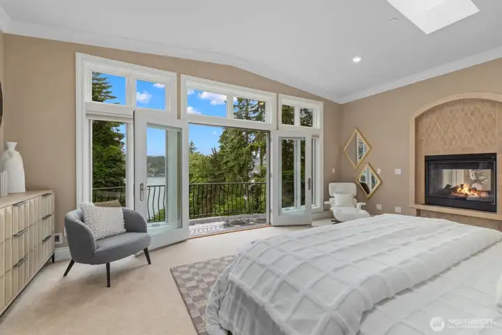 Steal away upstairs to your lake view primary suite with French doors opening to its own balcony. Steal away upstairs to your lake view primary suite with French doors opening to its own balcony.
