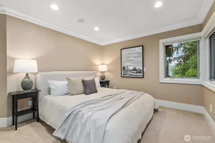 Third upstairs bedroom with wrap-around windows. Third upstairs bedroom with wrap-around windows.