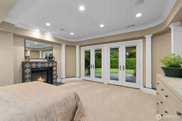 Lower level bedroom suite with its own bathroom, walk-in closet, & patio access--ideal for guests or an au pair. Lower level bedroom suite with its own bathroom, walk-in closet, & patio access--ideal for guests or an au pair.