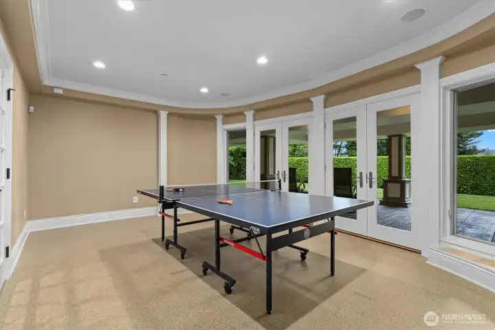 Lower level game room can also be a workout room with commercial grade padded floors. Lower level game room can also be a workout room with commercial grade padded floors.