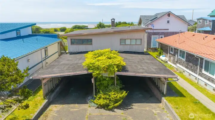 Are you looking for a great beach project? This may be for you! It's a fixer with lots of potential! Are you looking for a great beach project? This may be for you! It's a fixer with lots of potential!