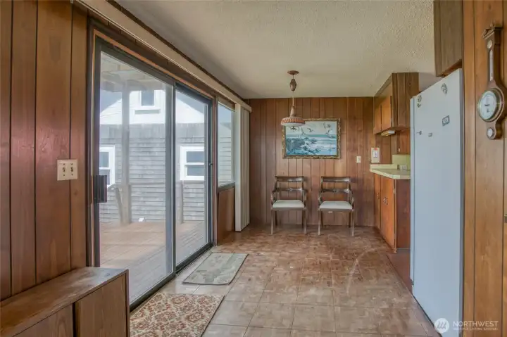Dining space with access to westside covered porch. Dining space with access to westside covered porch.