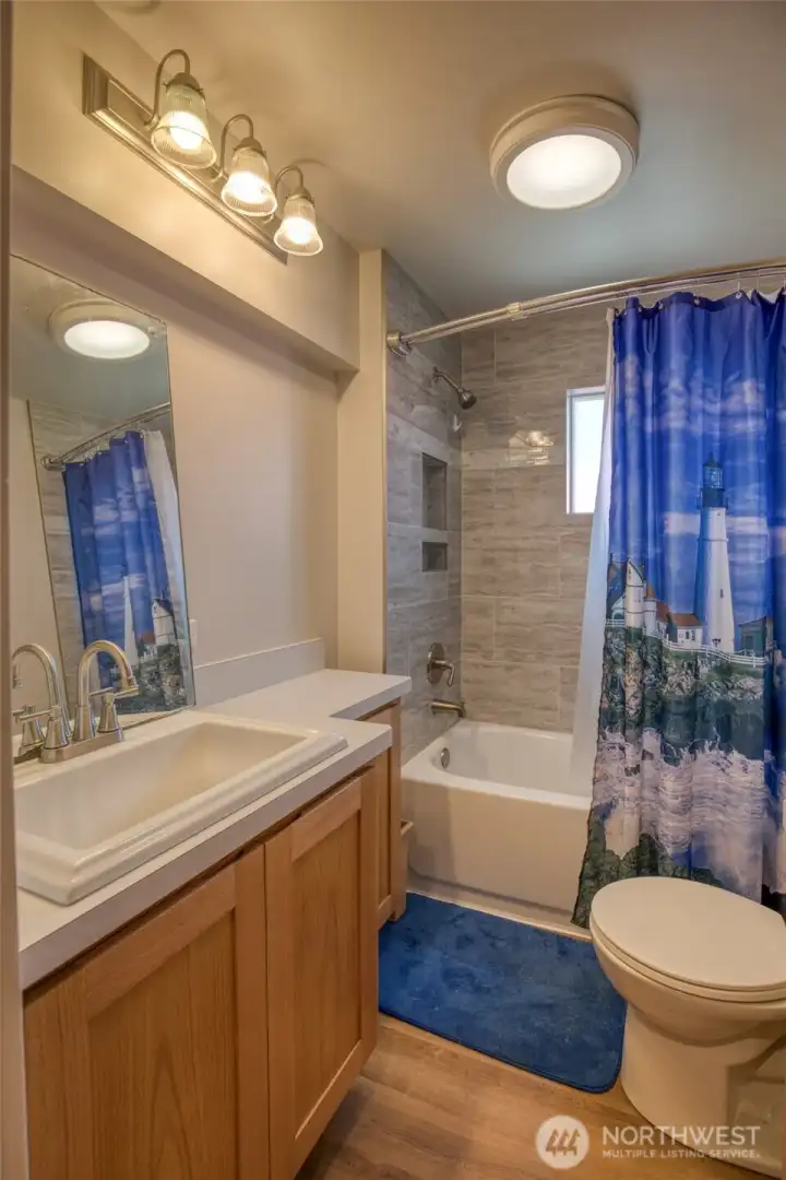 Updated bath with tub/shower. Updated bath with tub/shower.