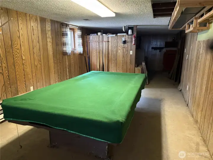 Downstairs is a bonus room and includes a pool table. Downstairs is a bonus room and includes a pool table.