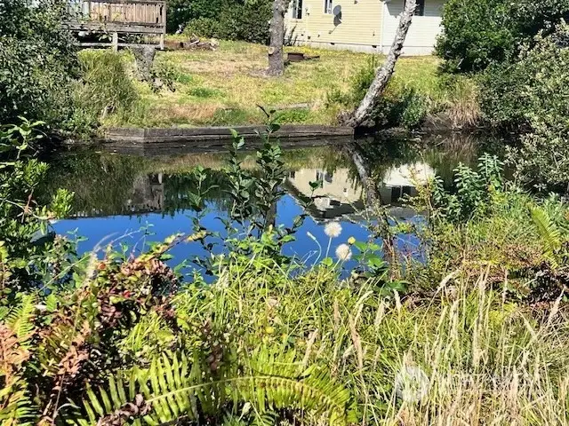 Large property on the Canal just blocks to the beach.