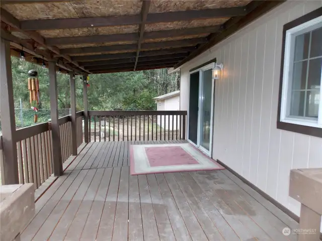 Covered back patio great for entertaining.