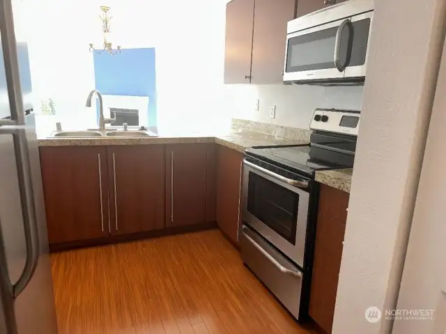 View from kitchen into dining and living space