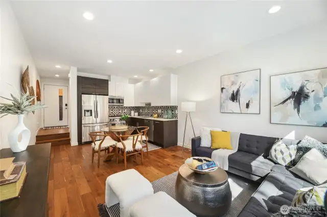 Entry level open concept living, dining, kitchen.