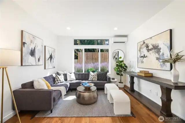 Entry level open concept living, dining, kitchen.