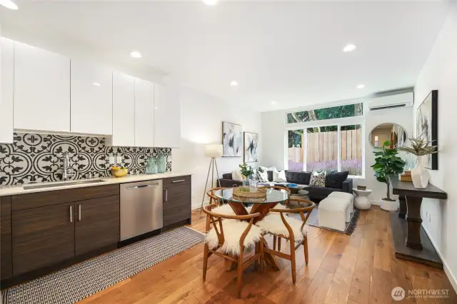 Entry level open concept living, dining, kitchen.