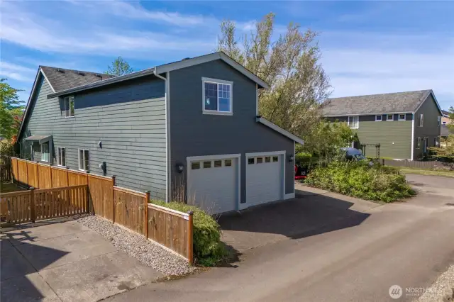 Spacious 2 car garage with alley access.