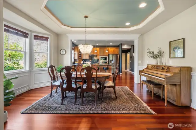 Enjoy your stunning dining room, highlighted with exquisite millwork and striking coffered ceiling.