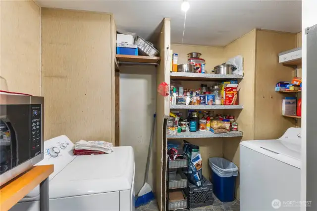 Pantry and laundry room off kitchen.