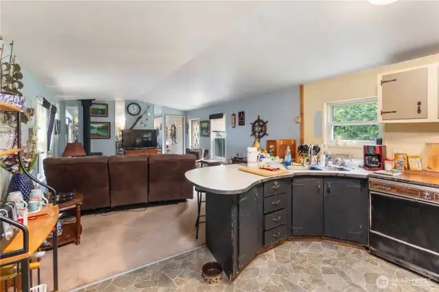 This Light and bright home offers an open floor plan and has vinyl windows throughout and a metal roof that was new in 2014.