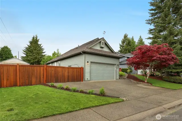 The fully fenced yard has large gates that can accommodate RV, boat, or trailer parking on the side of the home. This is a rare bonus feature for homes in the area.