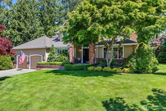 Curb appeal boasting timeless elegance!