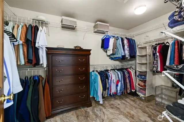 Large walk in closet. Room for a settee bench.